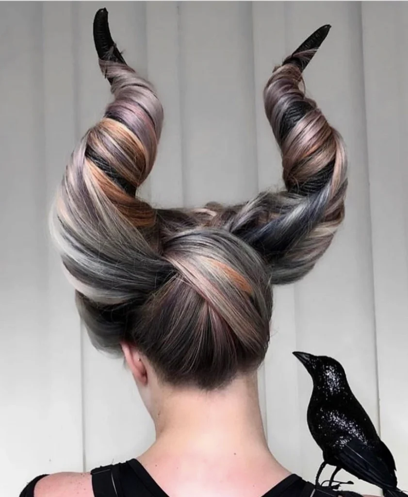 Braided Hairstyle Adorned with Glittering Spider Accessories