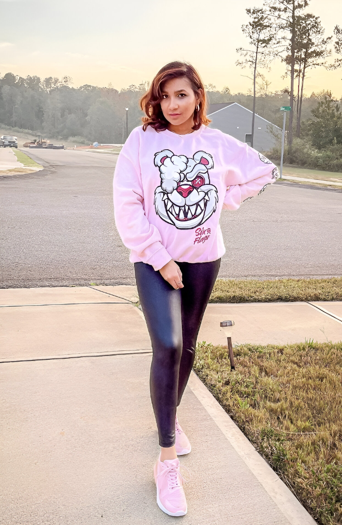 Pink Graphic Sweatshirt + Black High-Waisted Leggings + Pink Athletic Sneakers