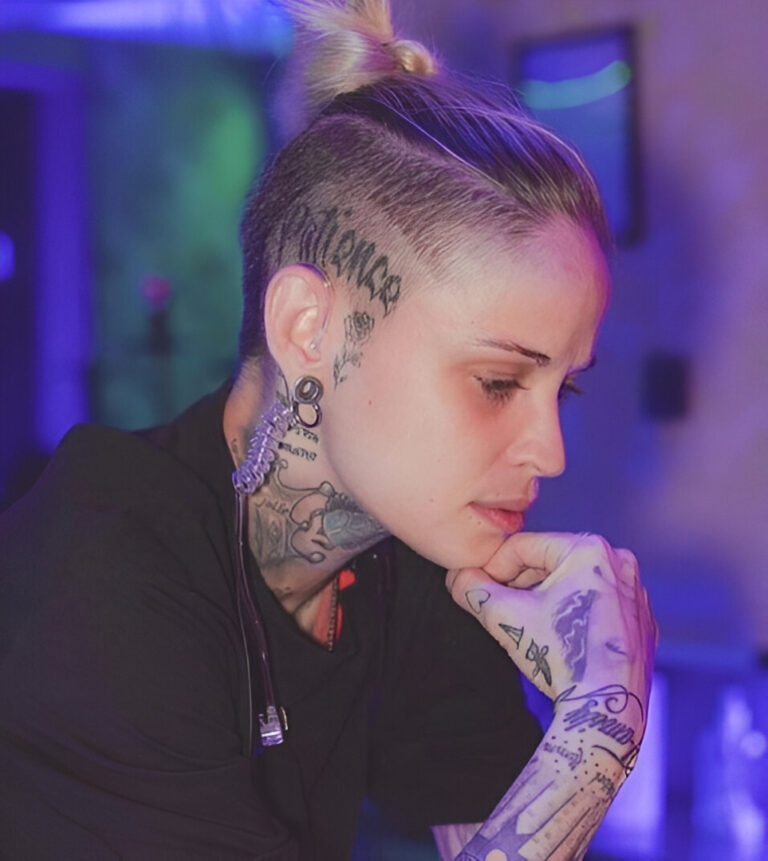 Edgy Tomboy Haircut with Short Sides and Textured Top