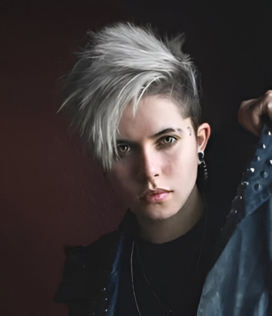 Short Tomboy Haircut with Bold Textured Layers and Asymmetrical Fringe