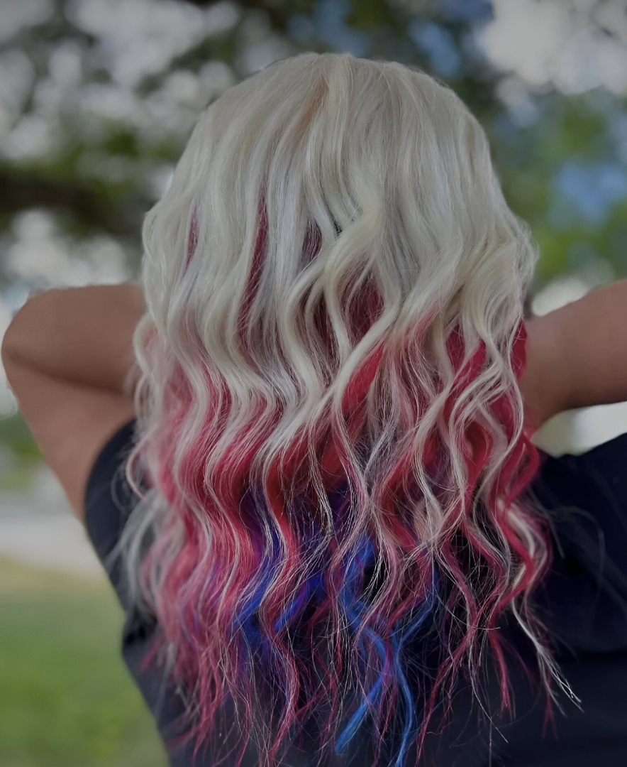Vibrant Wavy Hair with Red and Blue Highlights for a 4th of July Aesthetic