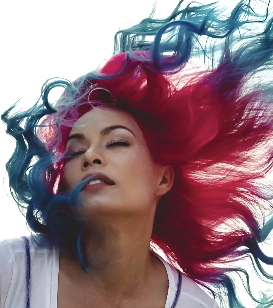 Vibrant Long Curly Waves with Bold Red and Blue Highlights